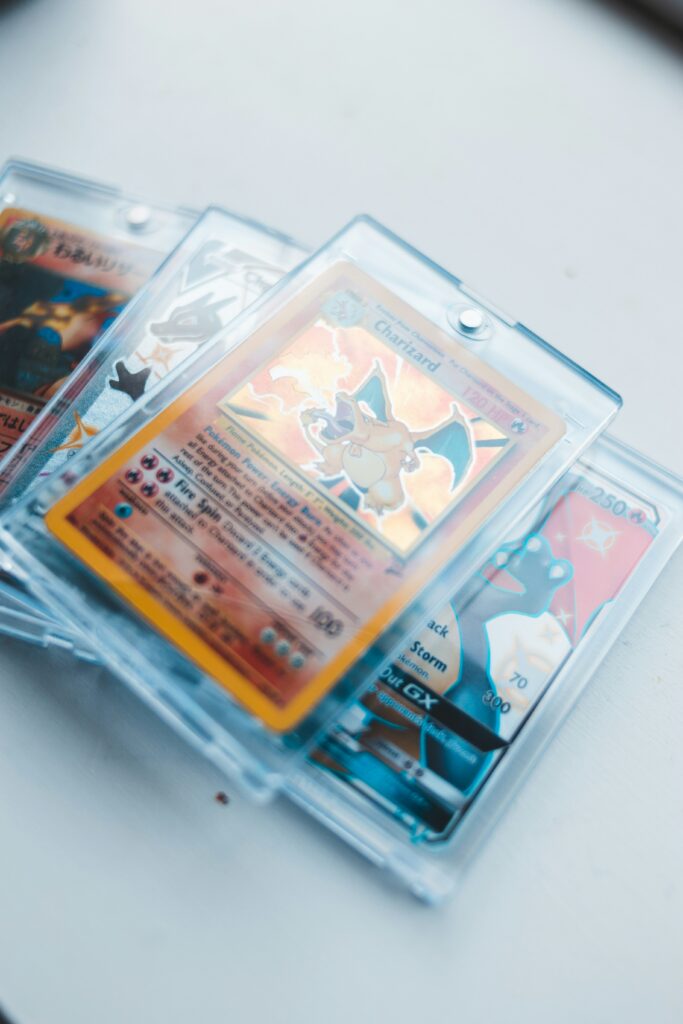 Stack of Pokémon cards in protective sleeves.